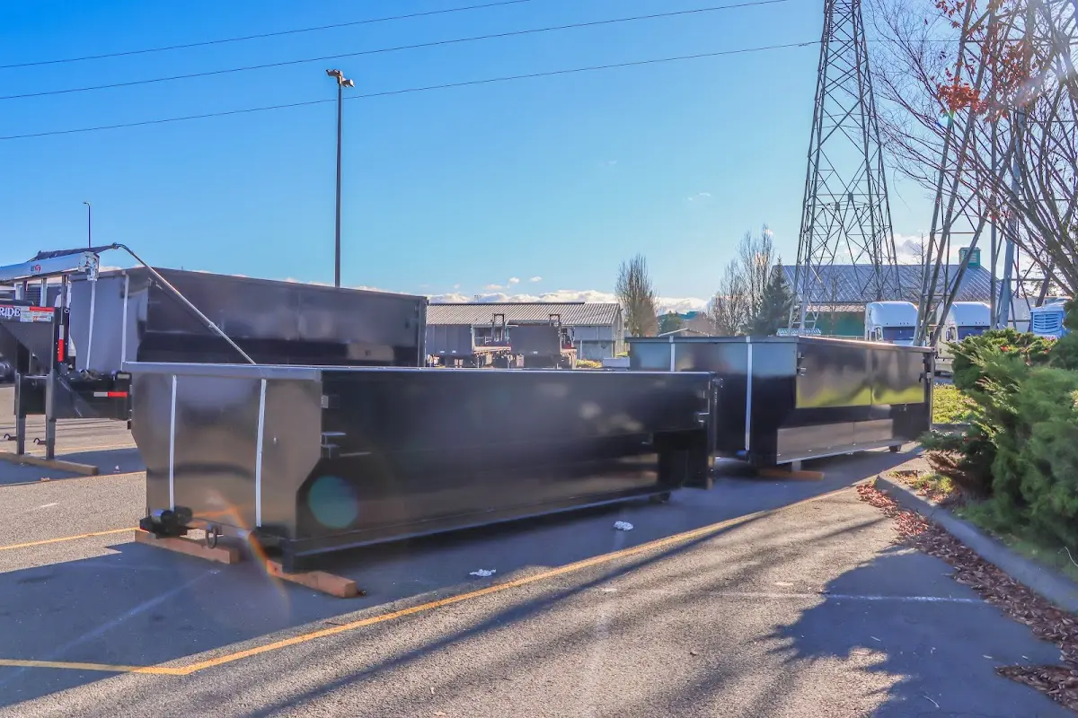 Roll-off dumpster ready for waste disposal at job site for 2 Yard Dumpster Rental in St. Simons